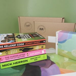 A stack of crime fiction novels